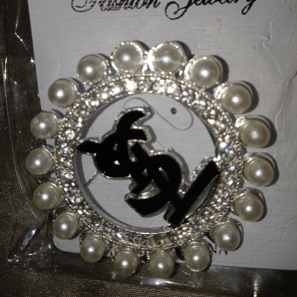 Inspired brooch